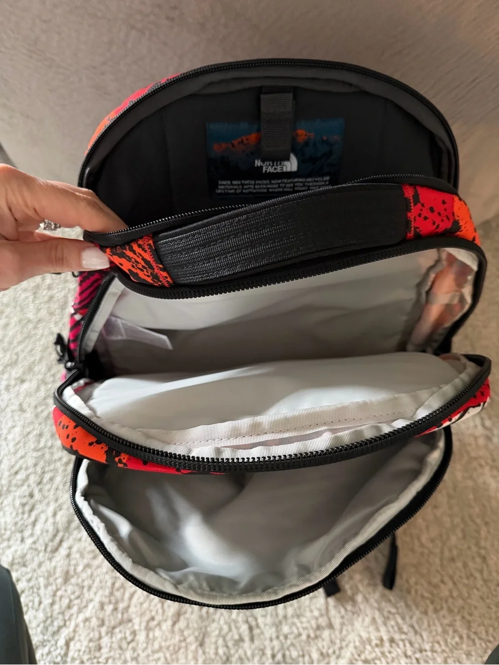 The North Face Red, Orange & Pink Graphic backpack